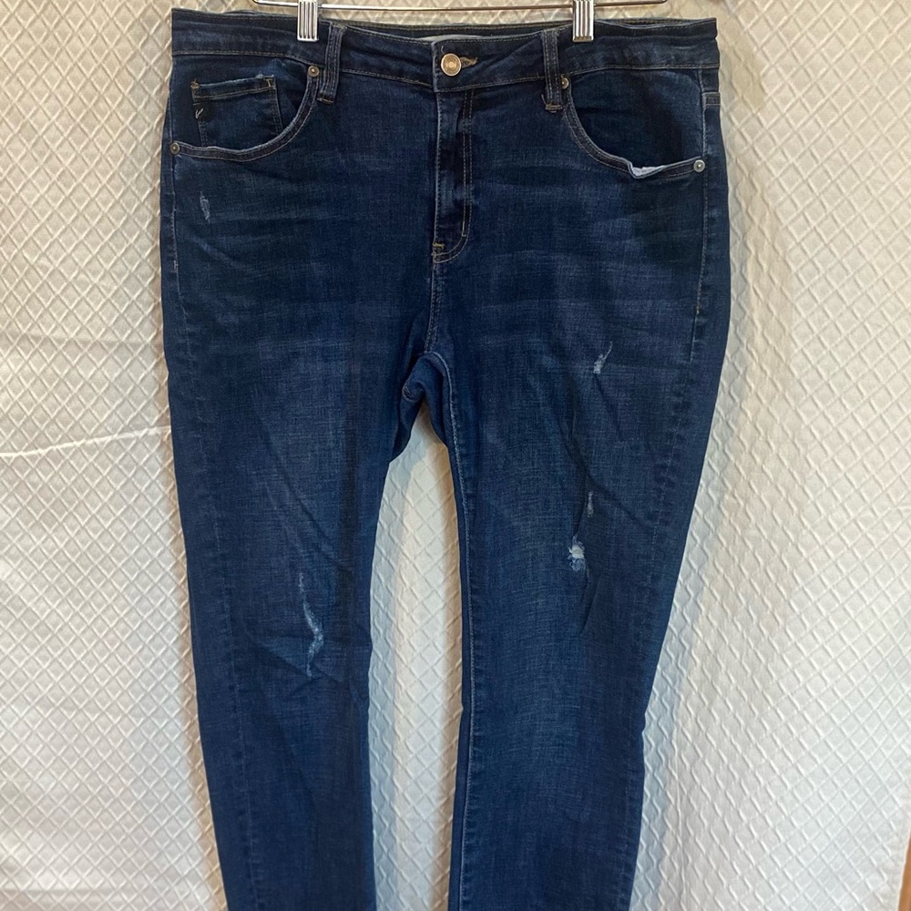 Kancan dark wash jeans. Modest distressing. Fringed cuffs. Size 15/31.